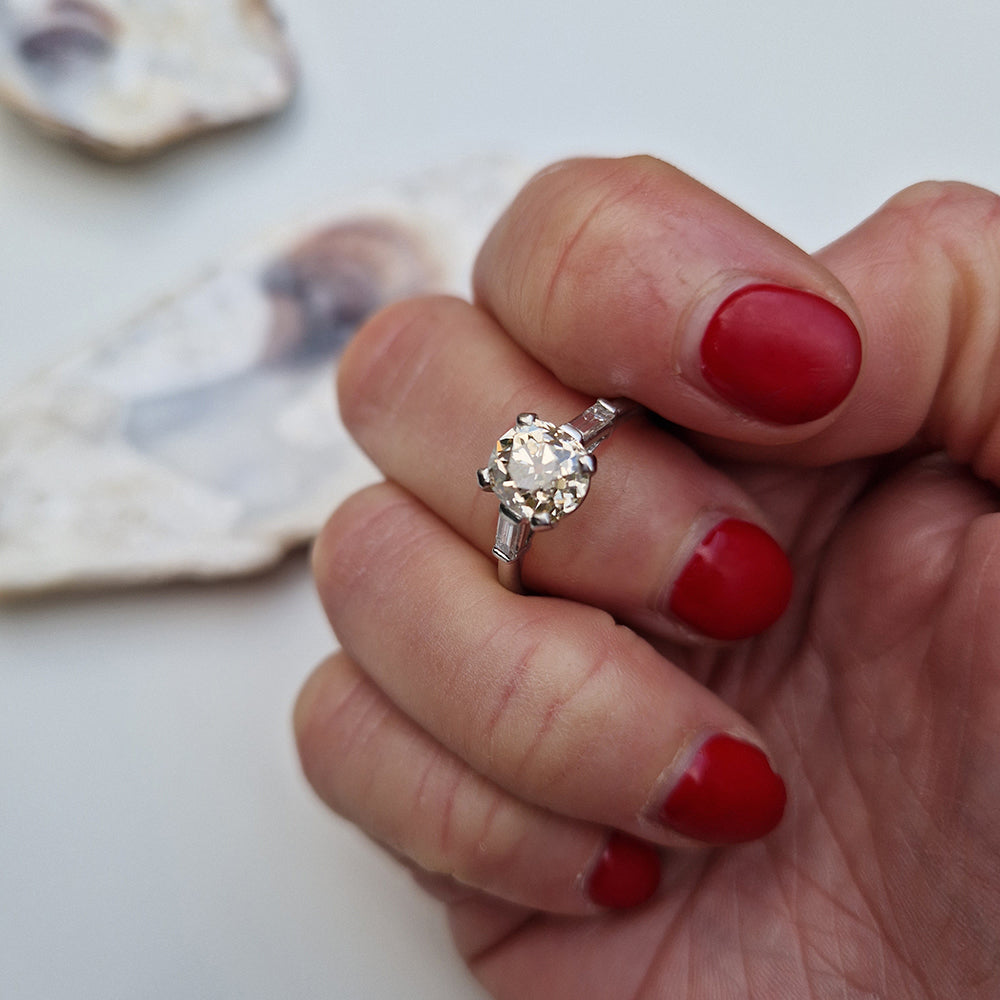 Antique Platinum Old European Cut Diamond Solitaire w/ Baguette Diamond Shoulders